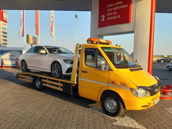 Preluare autoturism pe platformă