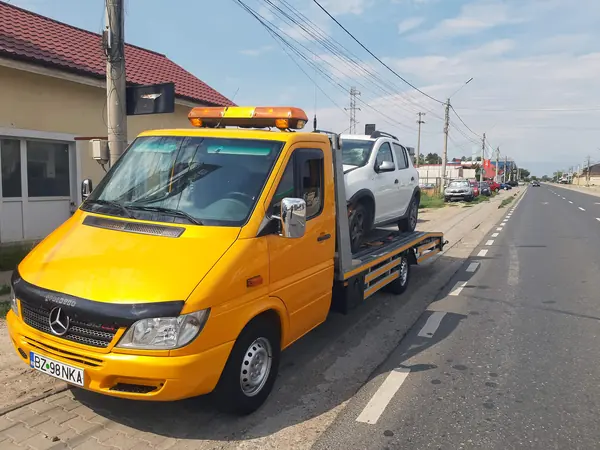 Tractare auto pe platformă